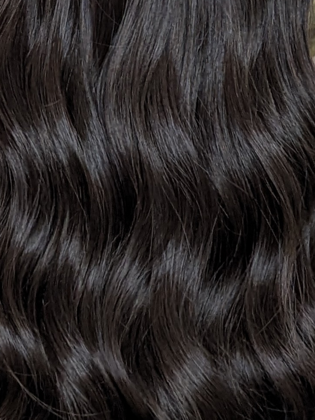 synthetic dark brown wig close up